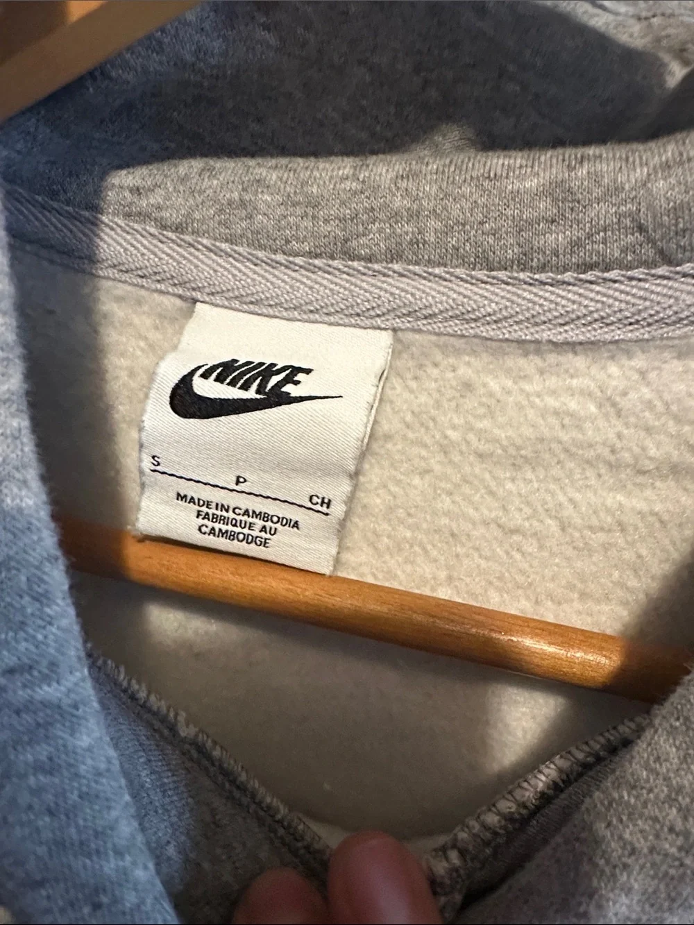 Nike Gray Hoodie with Blue Logo and Orange Swoosh Accent